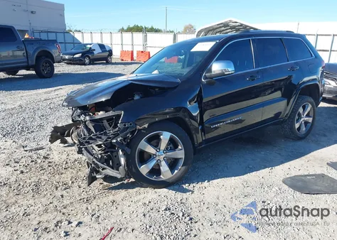 2014 Jeep Grand Cherokee Overland из США, поврежденный, VIN 1C4RJECG9EC351344